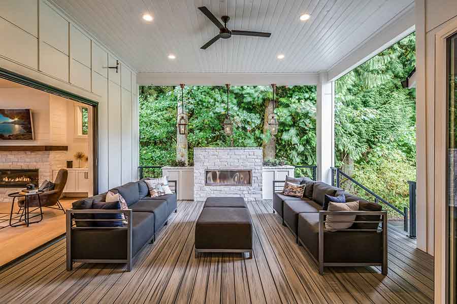 The Whitby Custom Home Back Exterior Deck with Fireplace