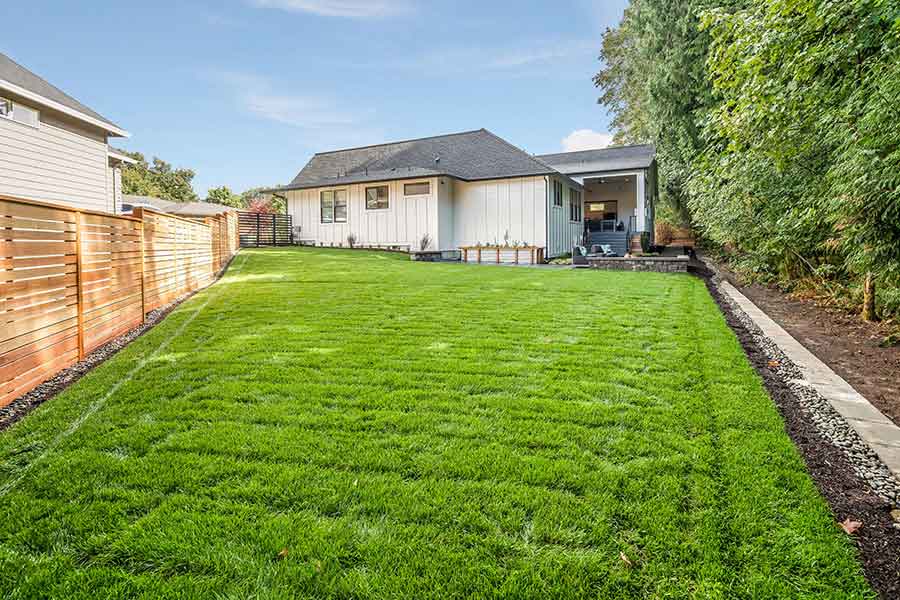 The Whitby Custom Home Back Exterior Yard