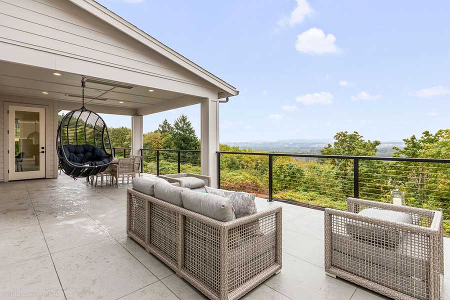 The Lily Custom Home Back Exterior Lower Deck